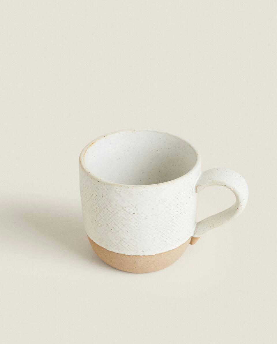 MUG WITH RAISED DESIGN