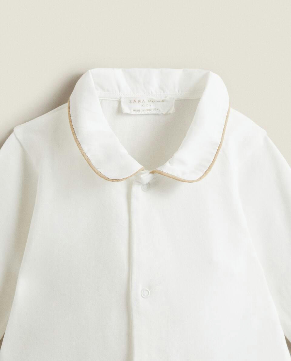 ROMPER WITH CONTRAST PIPING