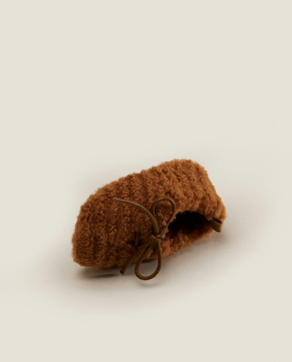 FAUX SHEARLING BOOTIES WITH BOW