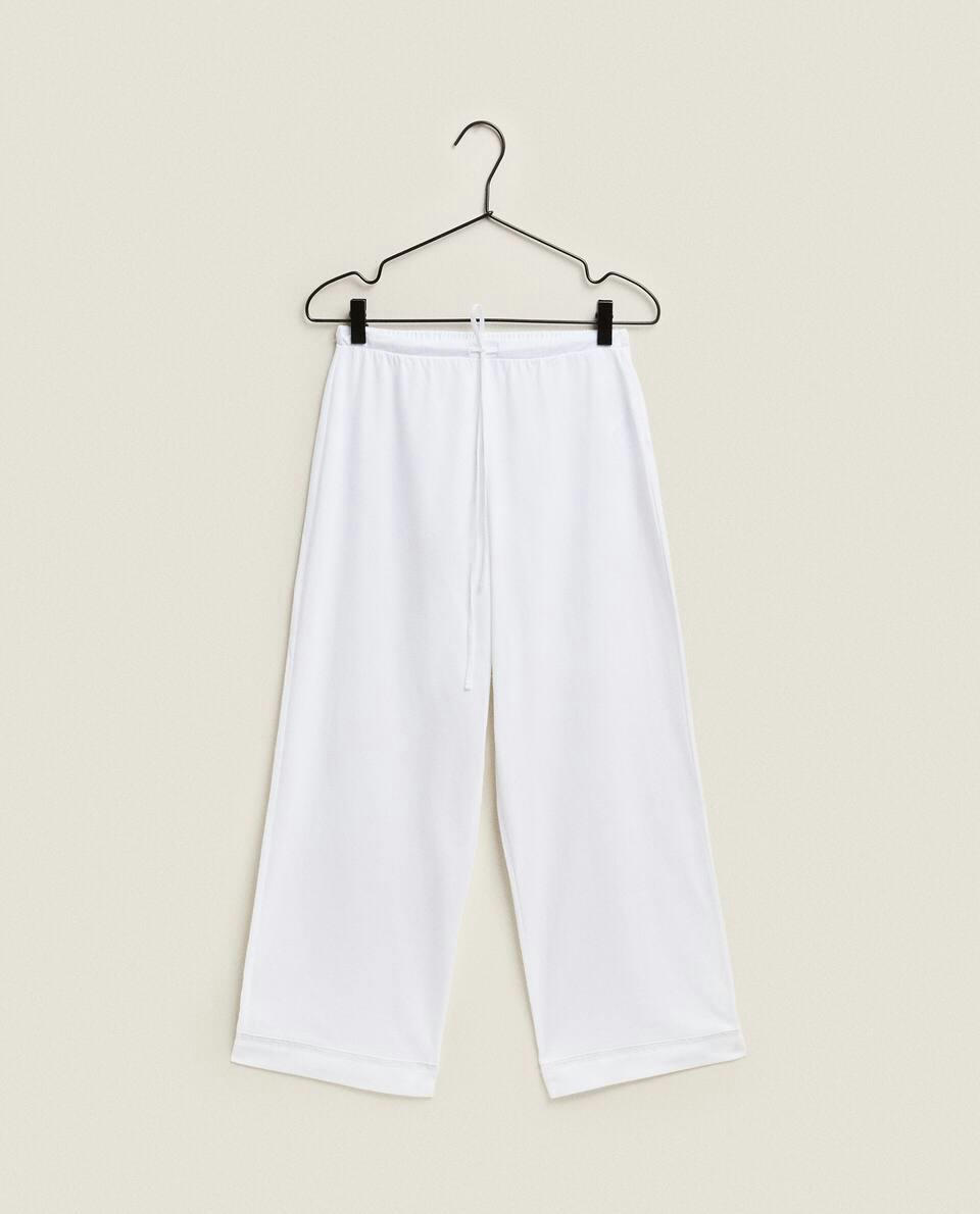 CROPPED TROUSERS WITH LACE TRIM