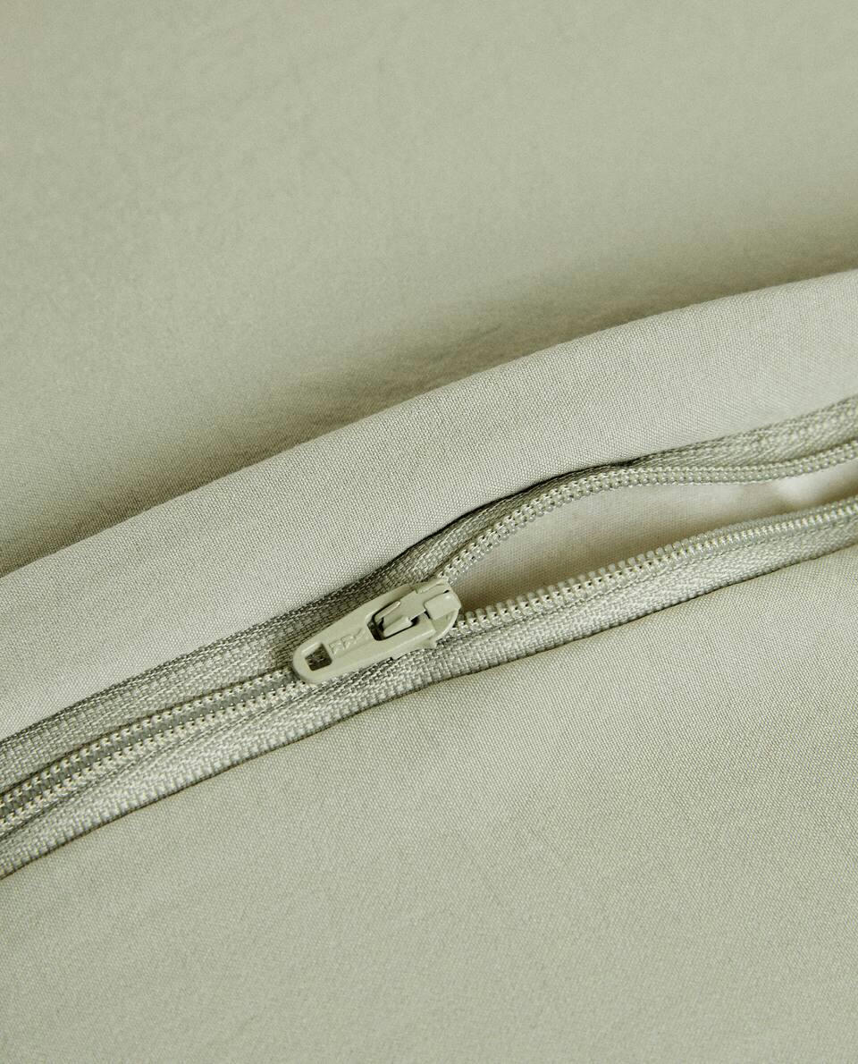 QUILTED DOTTED CUSHION COVER