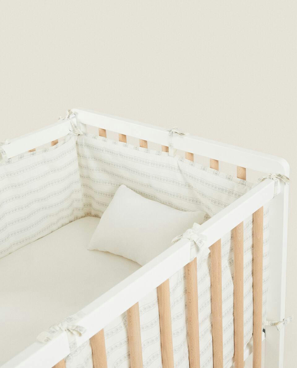 FLORAL BORDER COT BUMPER