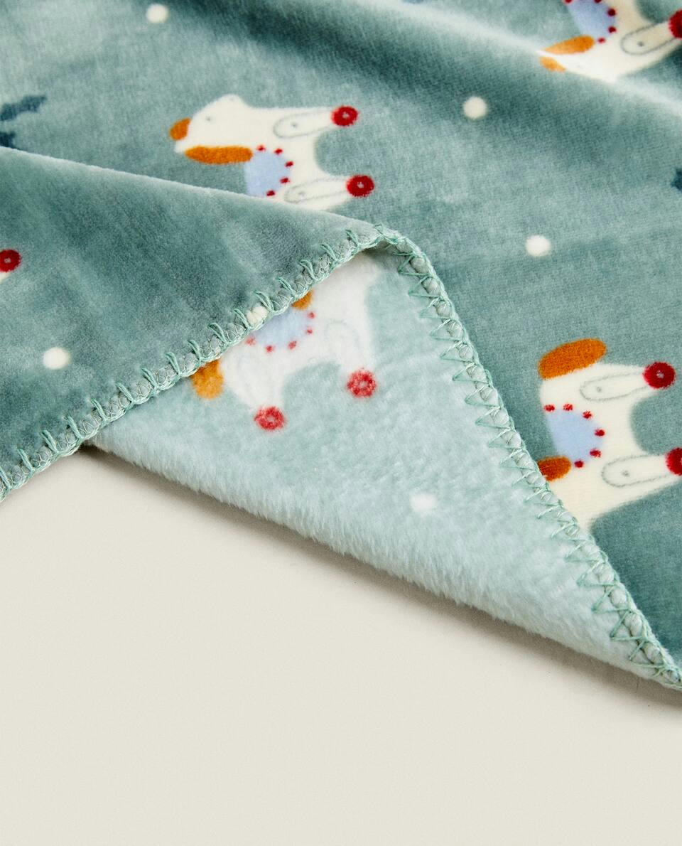 CHILDREN’S FLEECE BLANKET WITH CHRISTMAS ROCKING HORSE