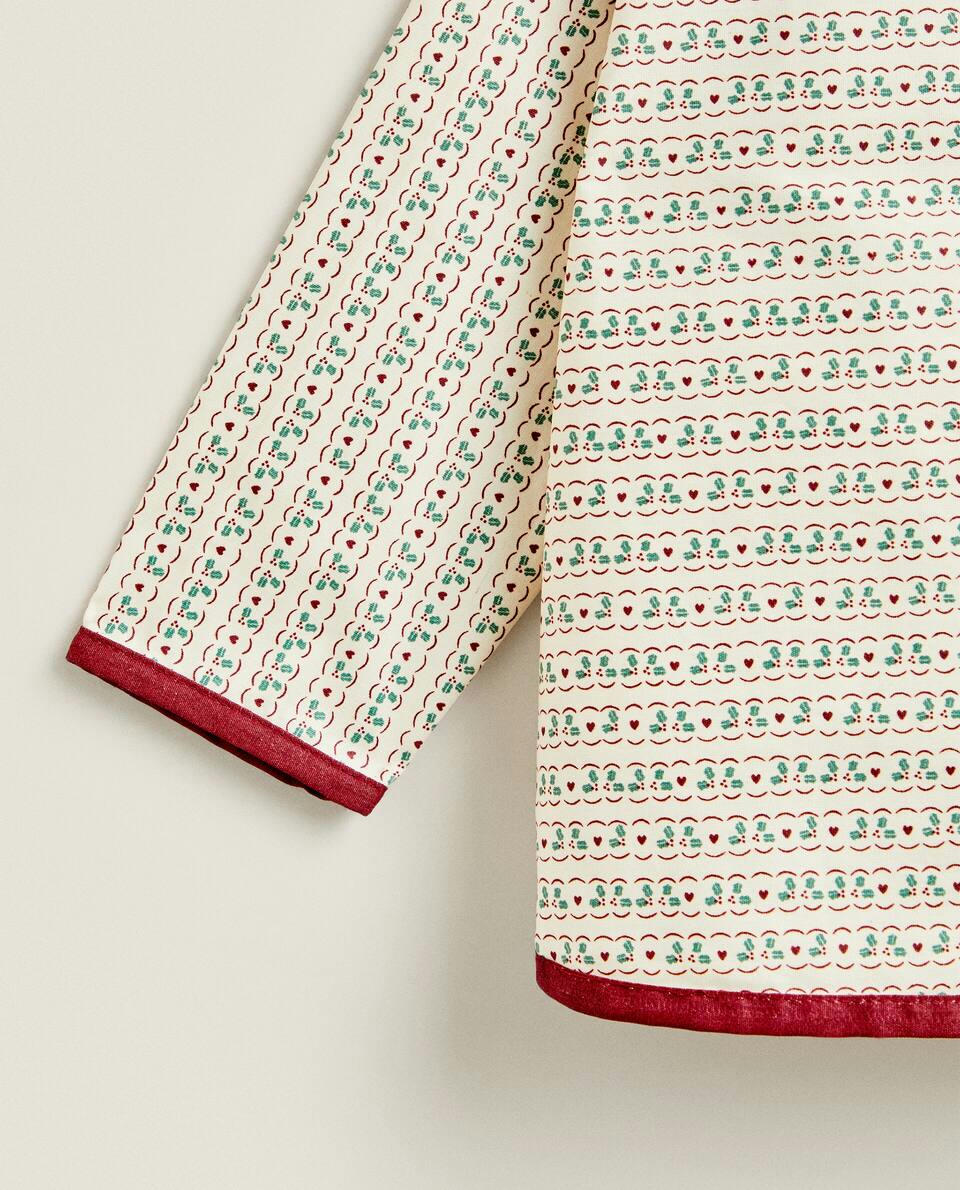 CHRISTMAS CHILDREN’S BIB WITH SLEEVES