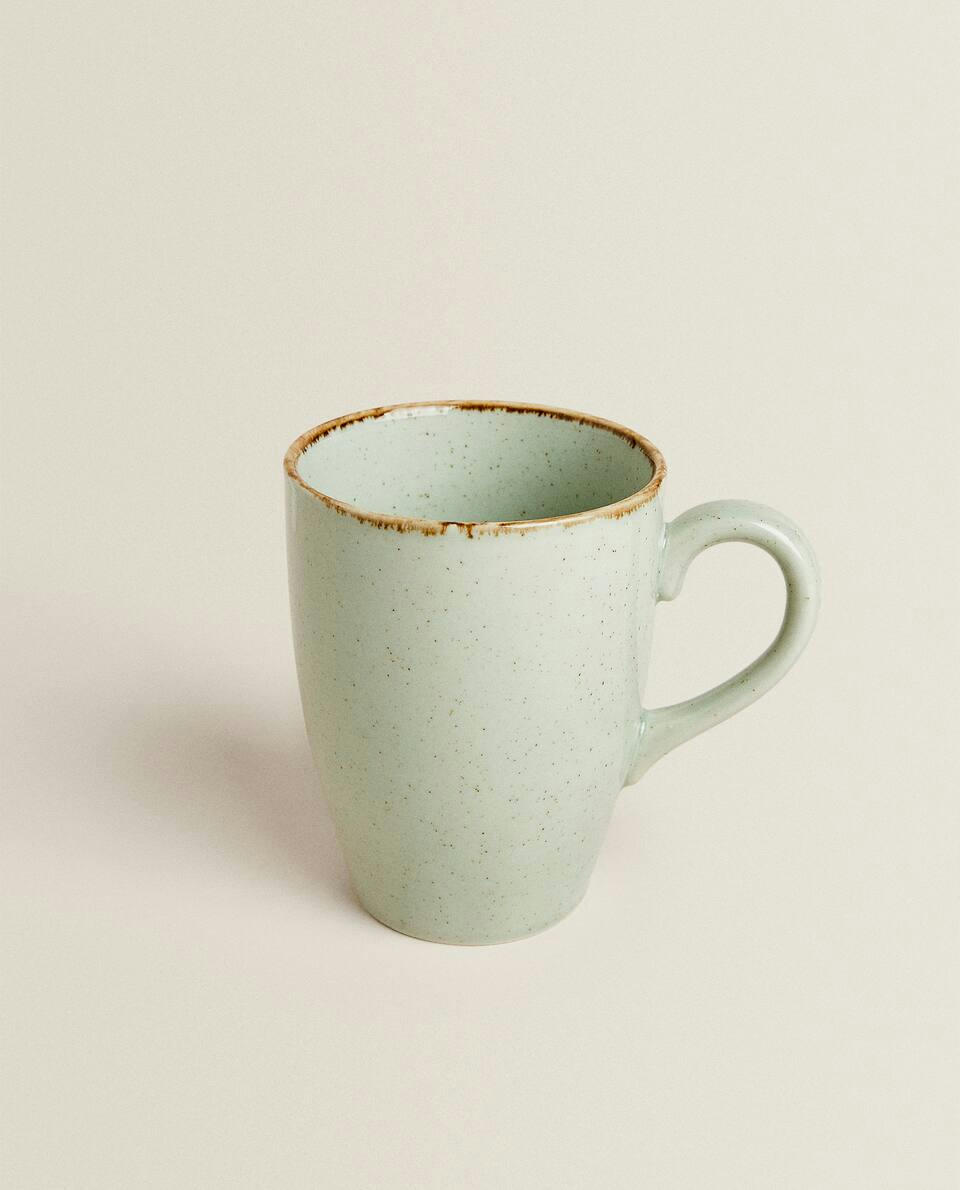 PORCELAIN MUG WITH ANTIQUE FINISH RIM