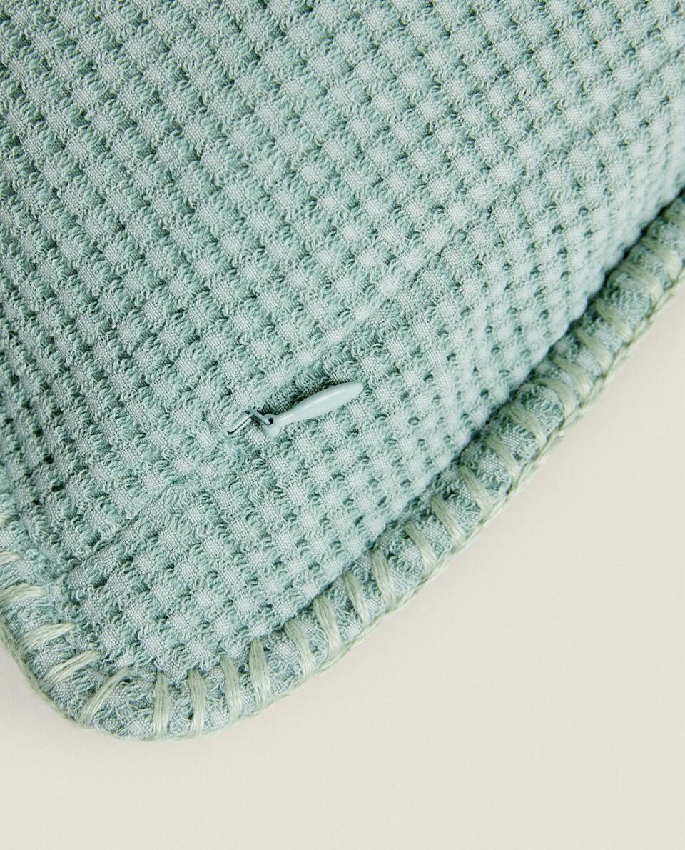 TEXTURED WAFFLE-KNIT CUSHION COVER