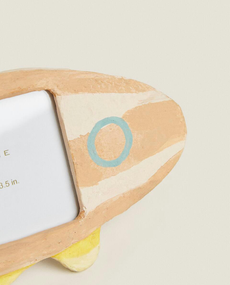 GLOW-IN-THE-DARK ROCKET PHOTO FRAME