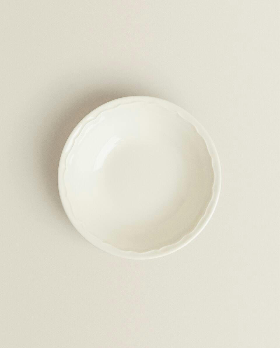 EARTHENWARE BOWL WITH RAISED-DESIGN EDGE
