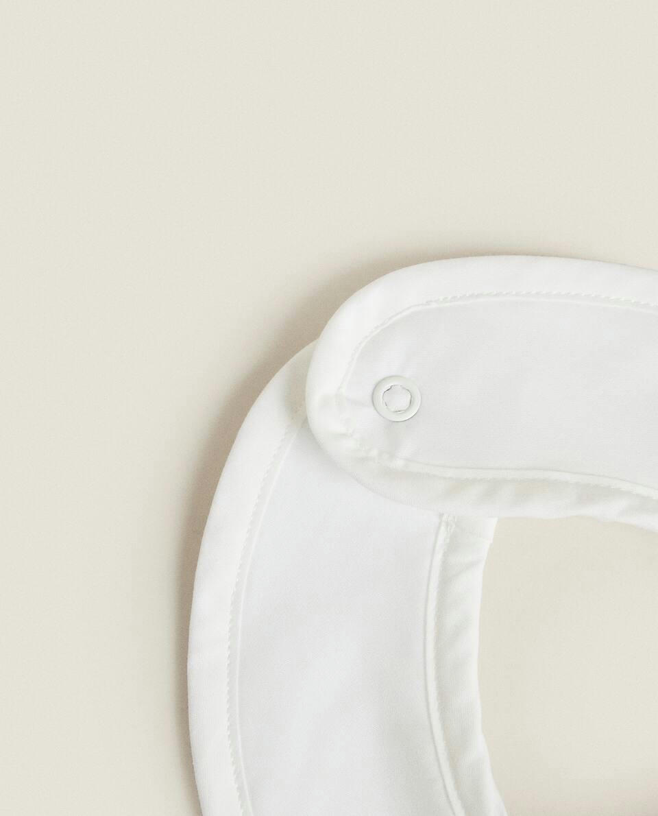 EMBROIDERED DUCK BIB