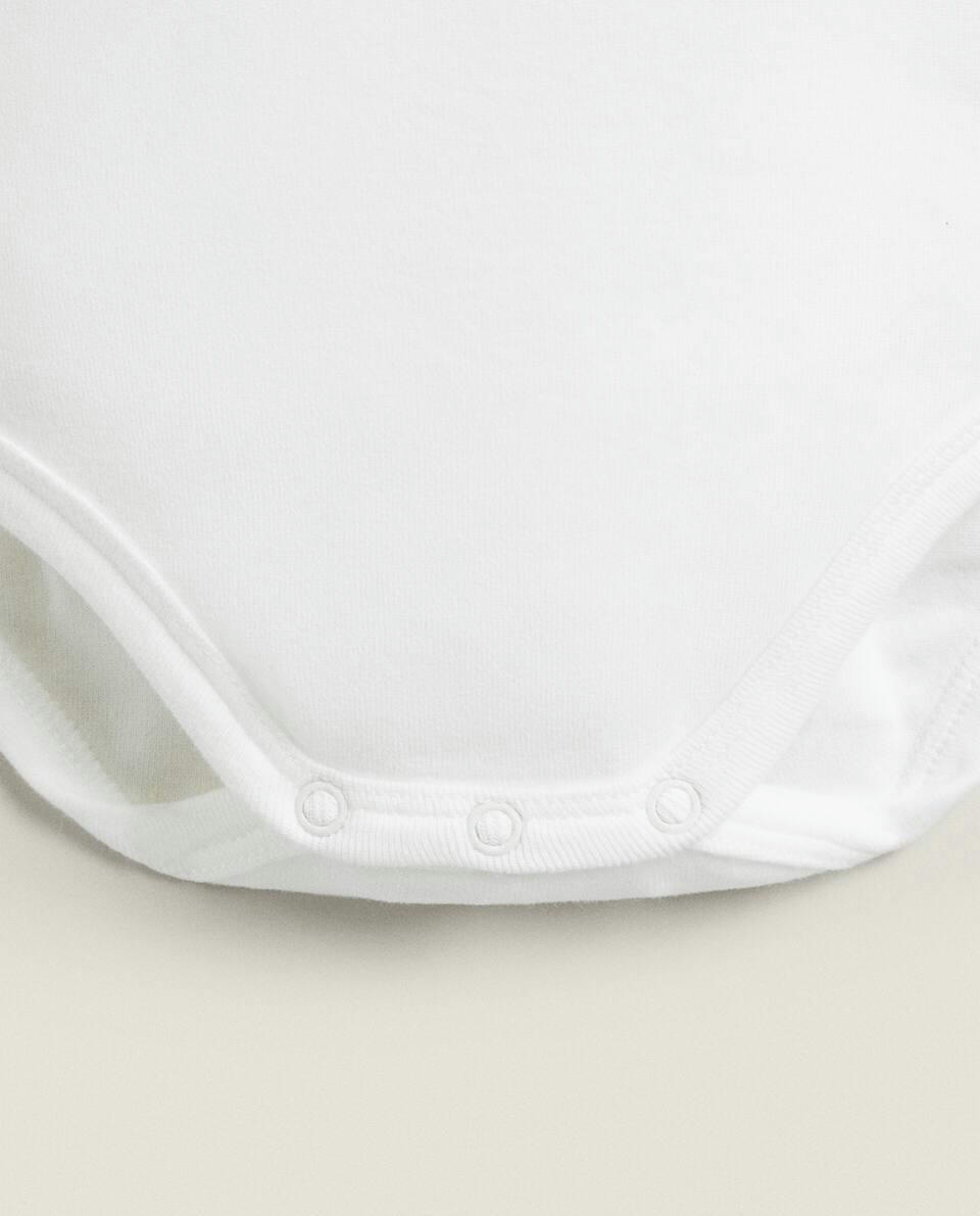 BODYSUIT WITH EMBROIDERED COLLAR