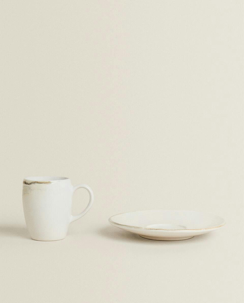STONEWARE COFFEE CUP AND SAUCER