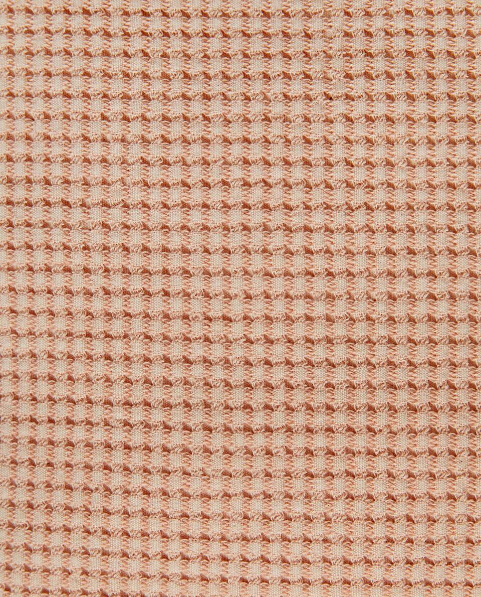 TEXTURED WAFFLE-KNIT CUSHION COVER