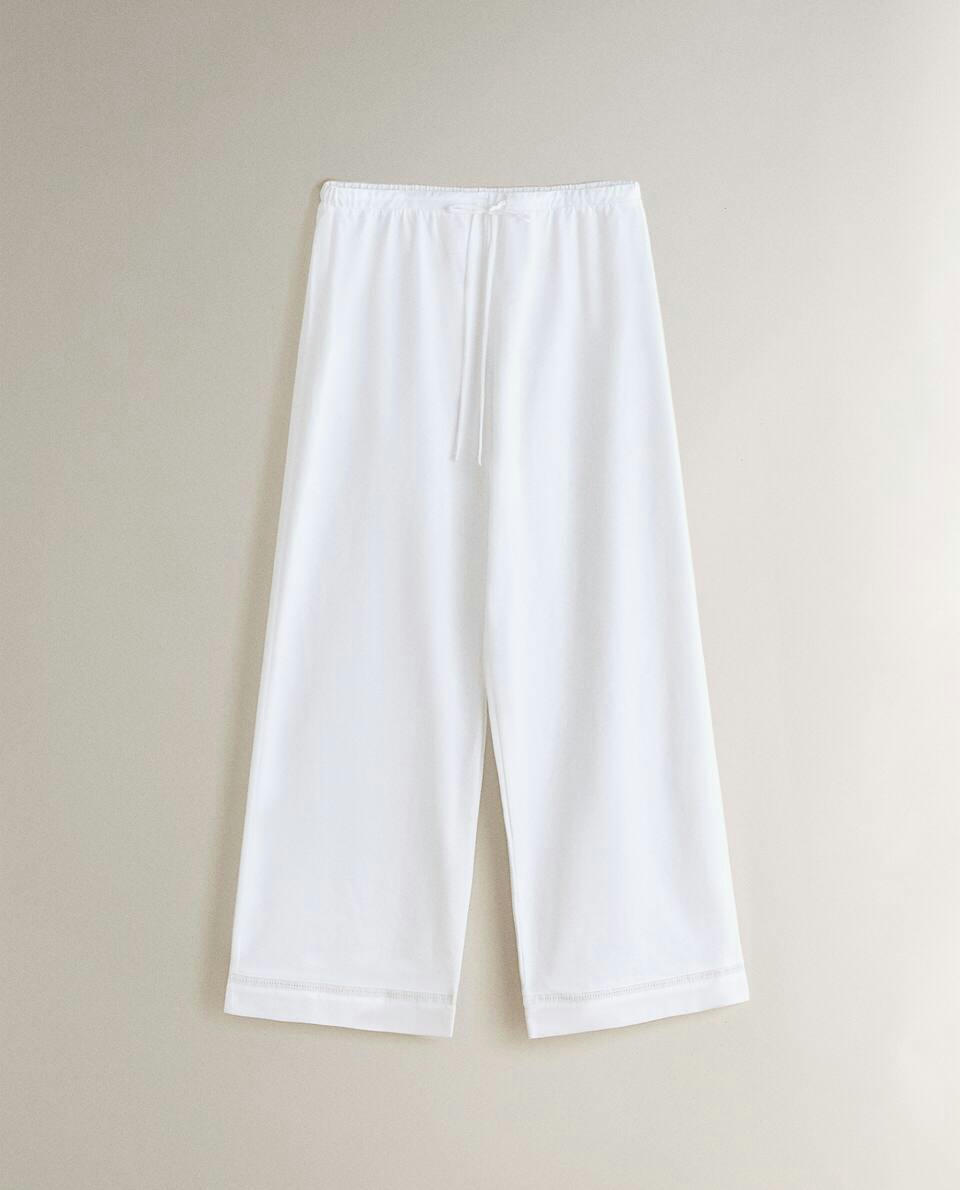 CROPPED TROUSERS WITH LACE TRIM