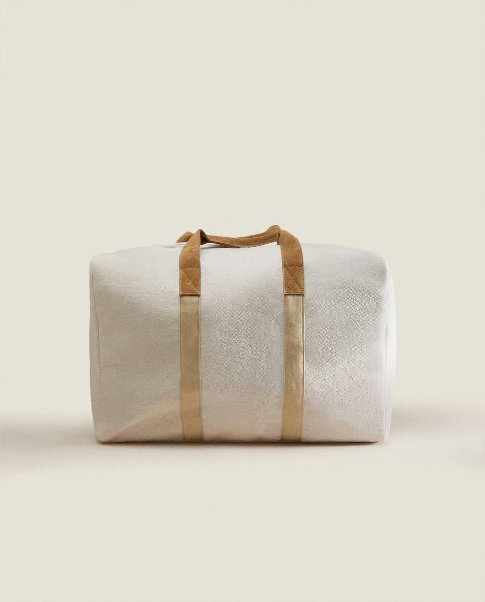 FABRIC TRAVEL BAG WITH LEATHER DETAIL