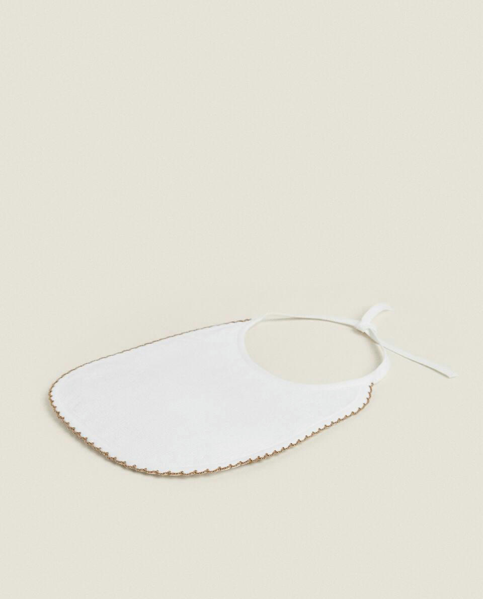 VELOUR BIB WITH TRIM DETAIL