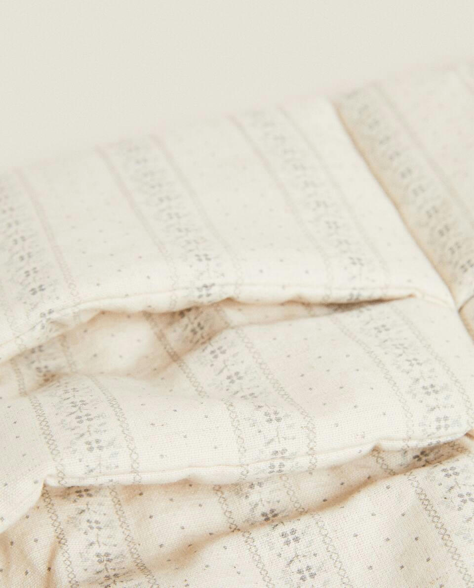 MUSLIN ORGANISER WITH BORDER