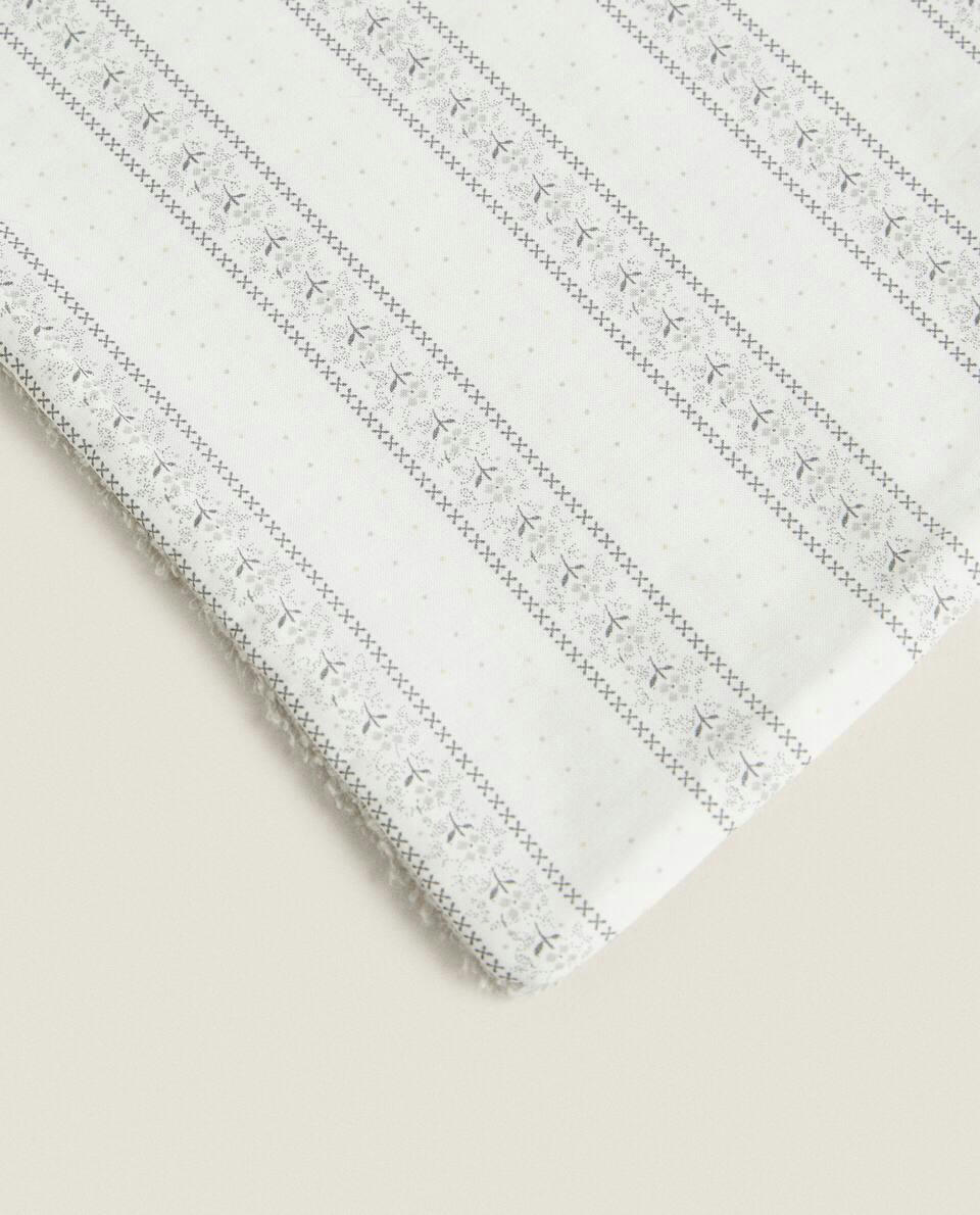 TOWEL WITH FLORAL BORDER