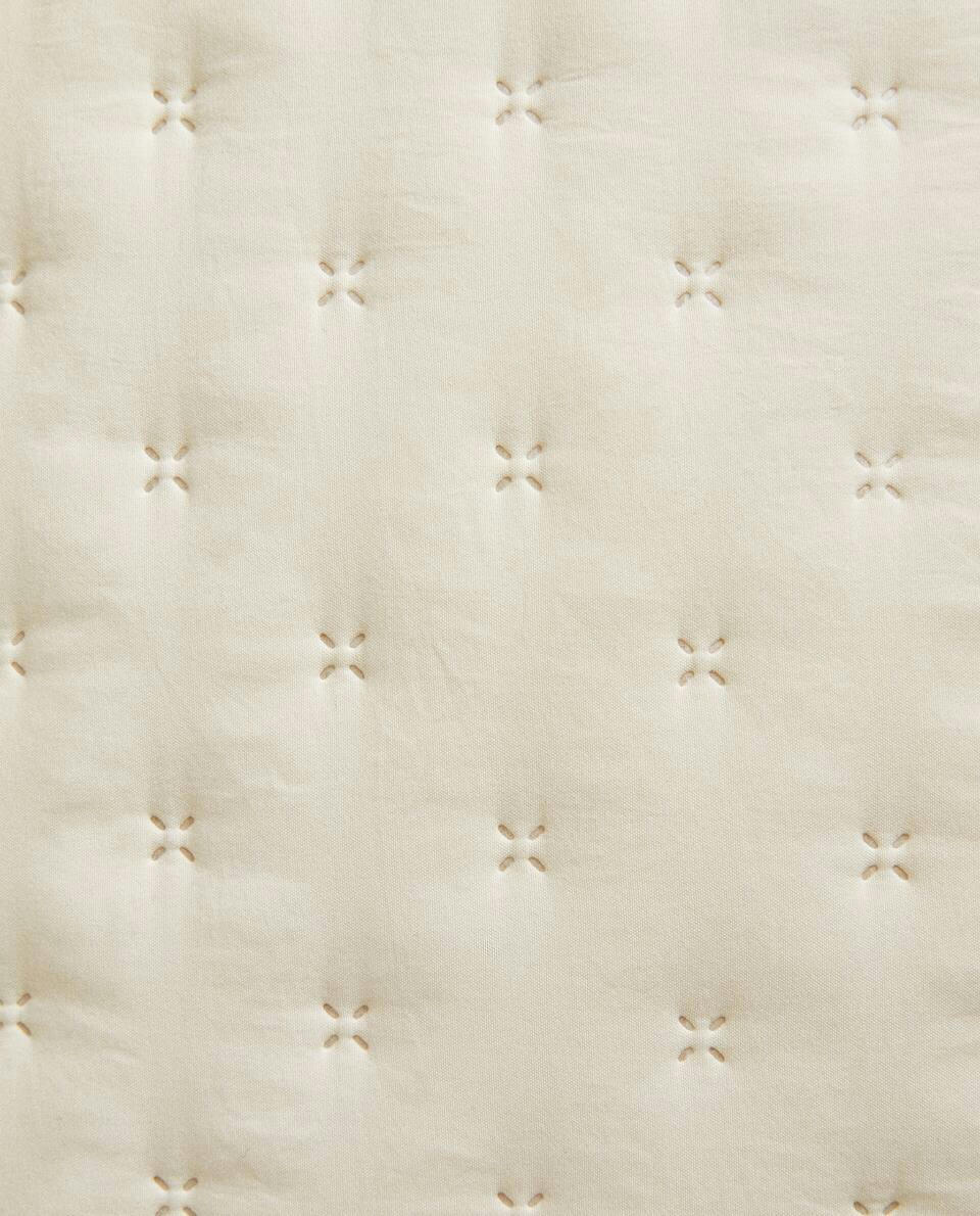 QUILTED DOTTED CUSHION COVER