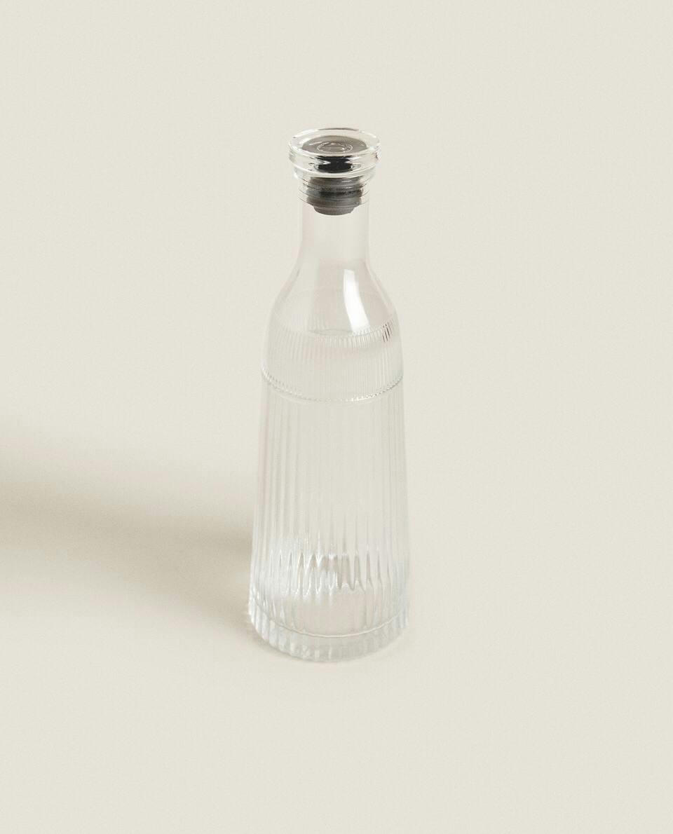 FACETED GLASS BOTTLE