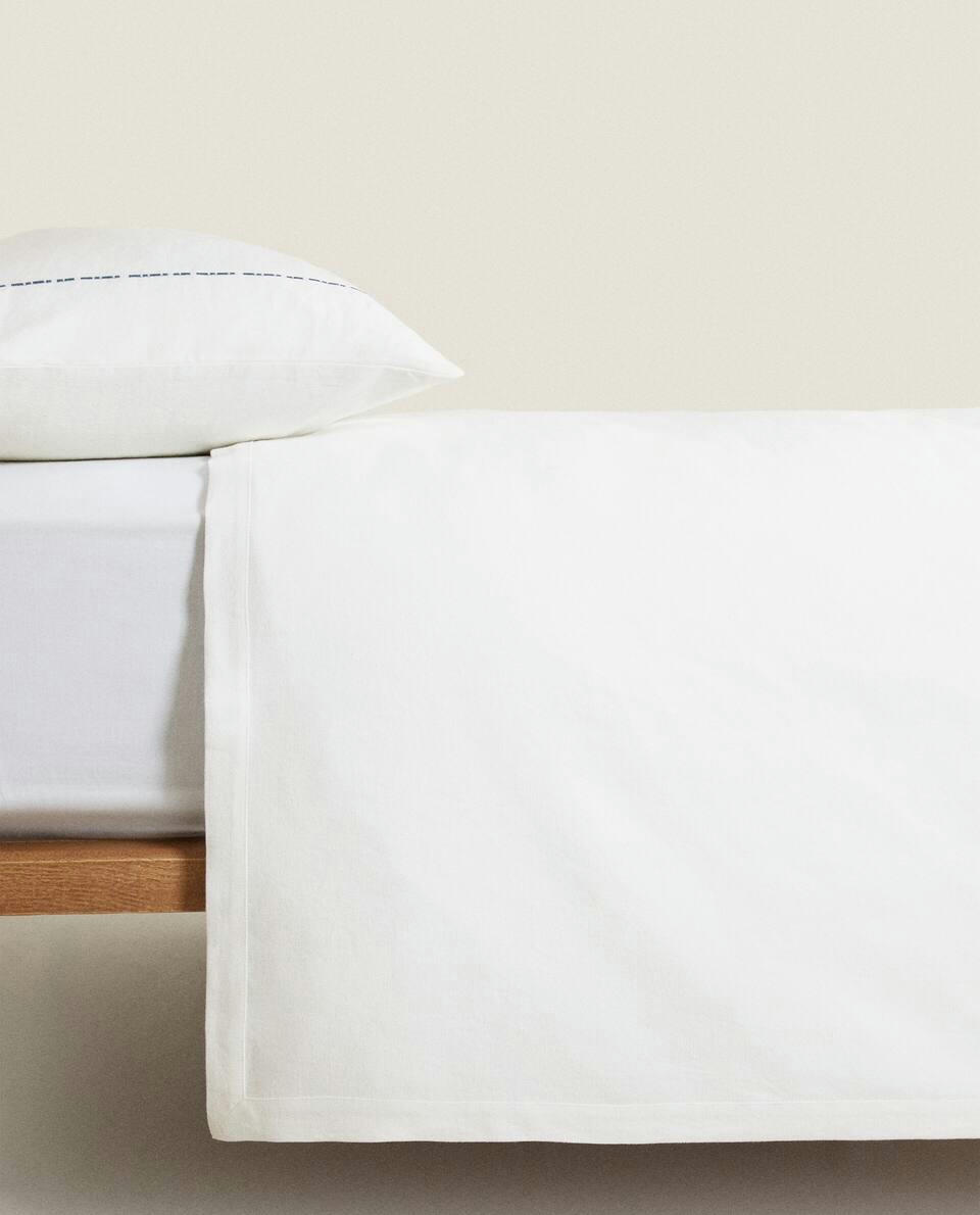 BEDSPREAD WITH TOPSTITCHING