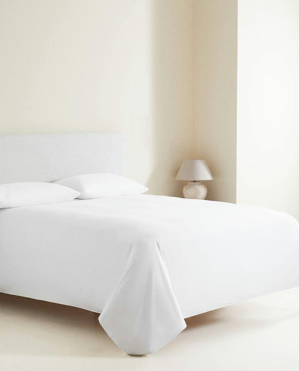 DUVET COVER WITH COLOURED PIPING DETAIL