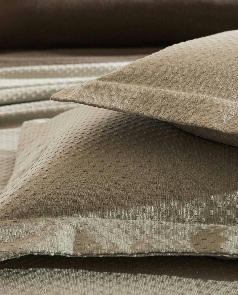 CUSHION COVER WITH POLKA DOT DESIGN