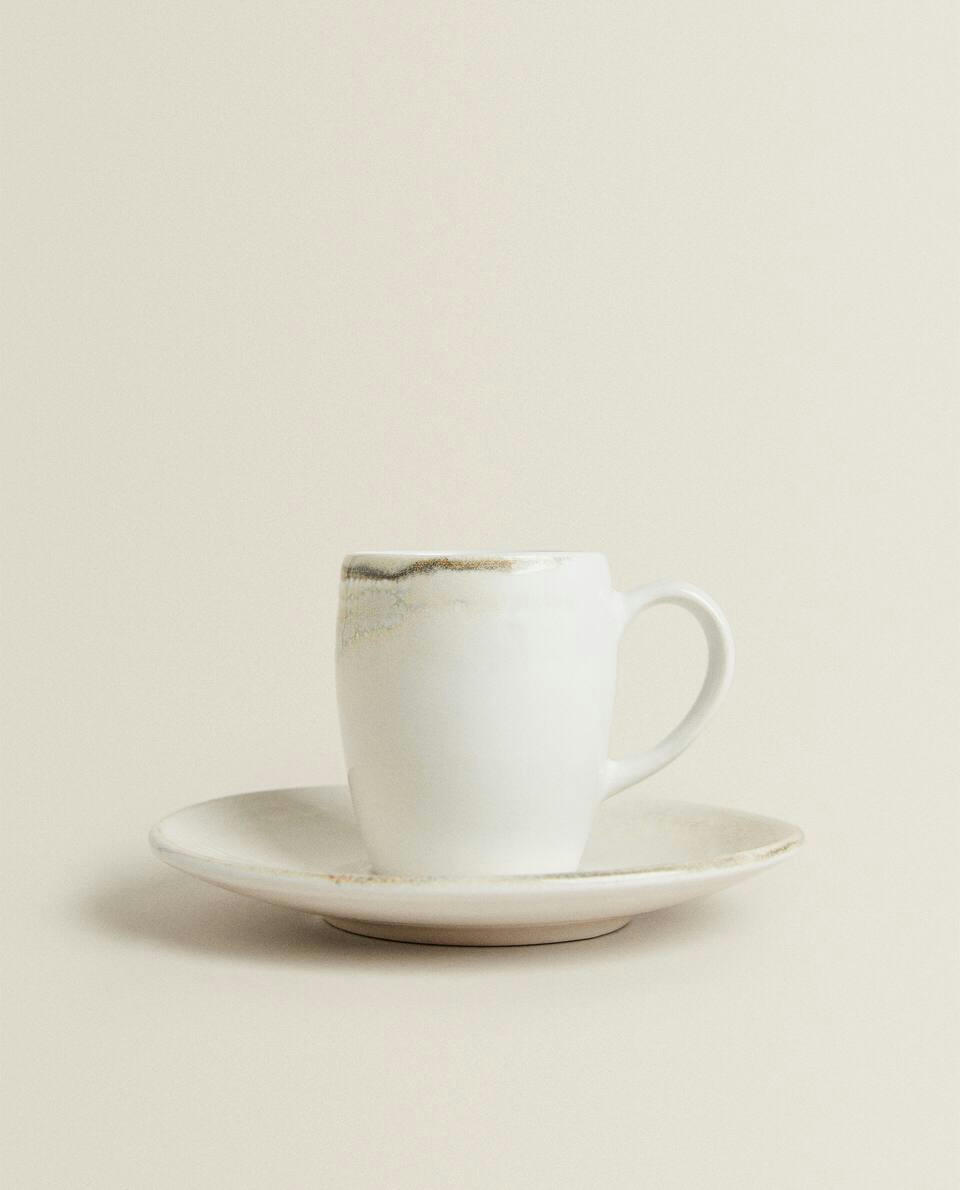 STONEWARE COFFEE CUP AND SAUCER