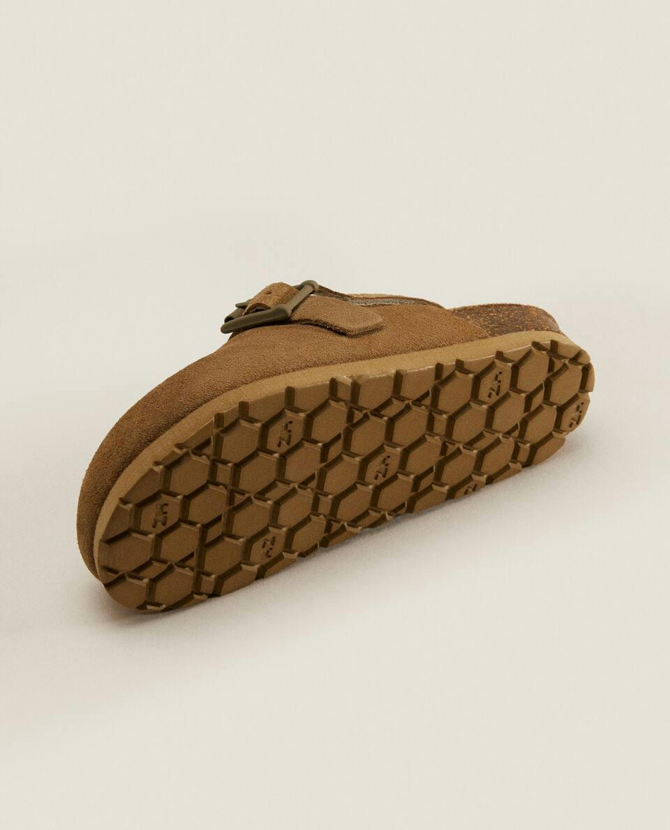 BUCKLED LEATHER CLOGS