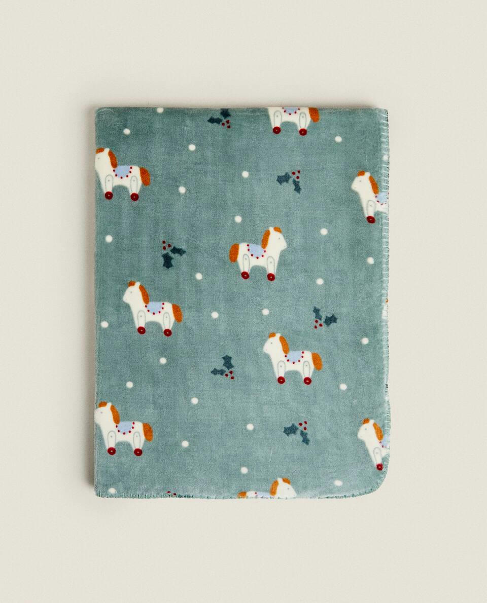 CHILDREN’S FLEECE BLANKET WITH CHRISTMAS ROCKING HORSE