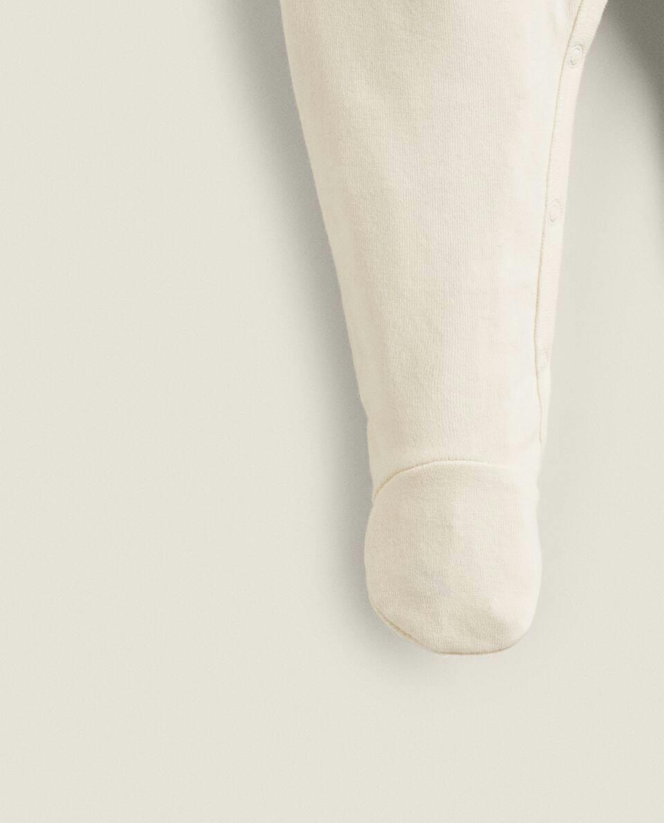 FLORAL PRINT FABRIC CHILDREN'S ROMPER SUIT WITH COLLAR DETAIL