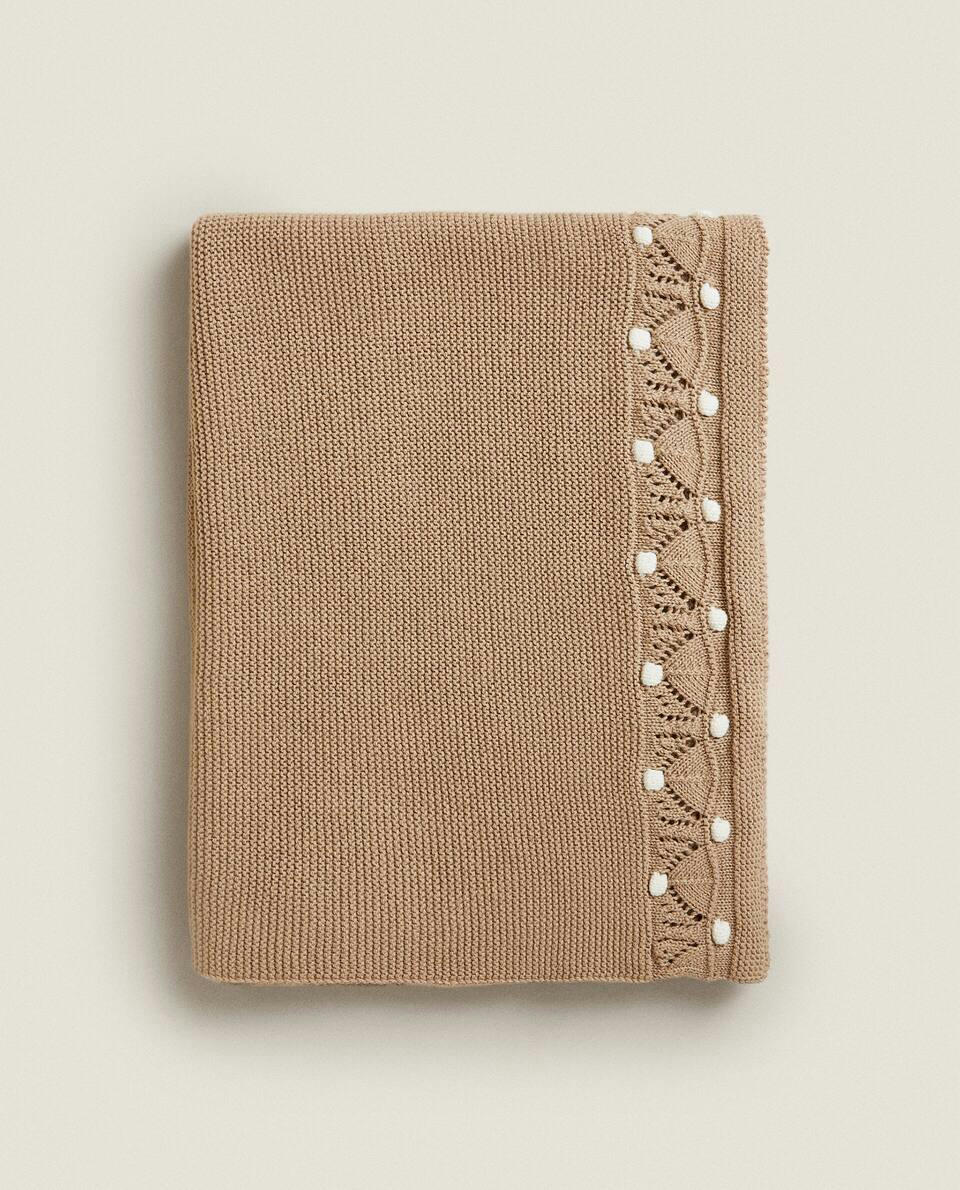 KNIT BLANKET WITH BORDER