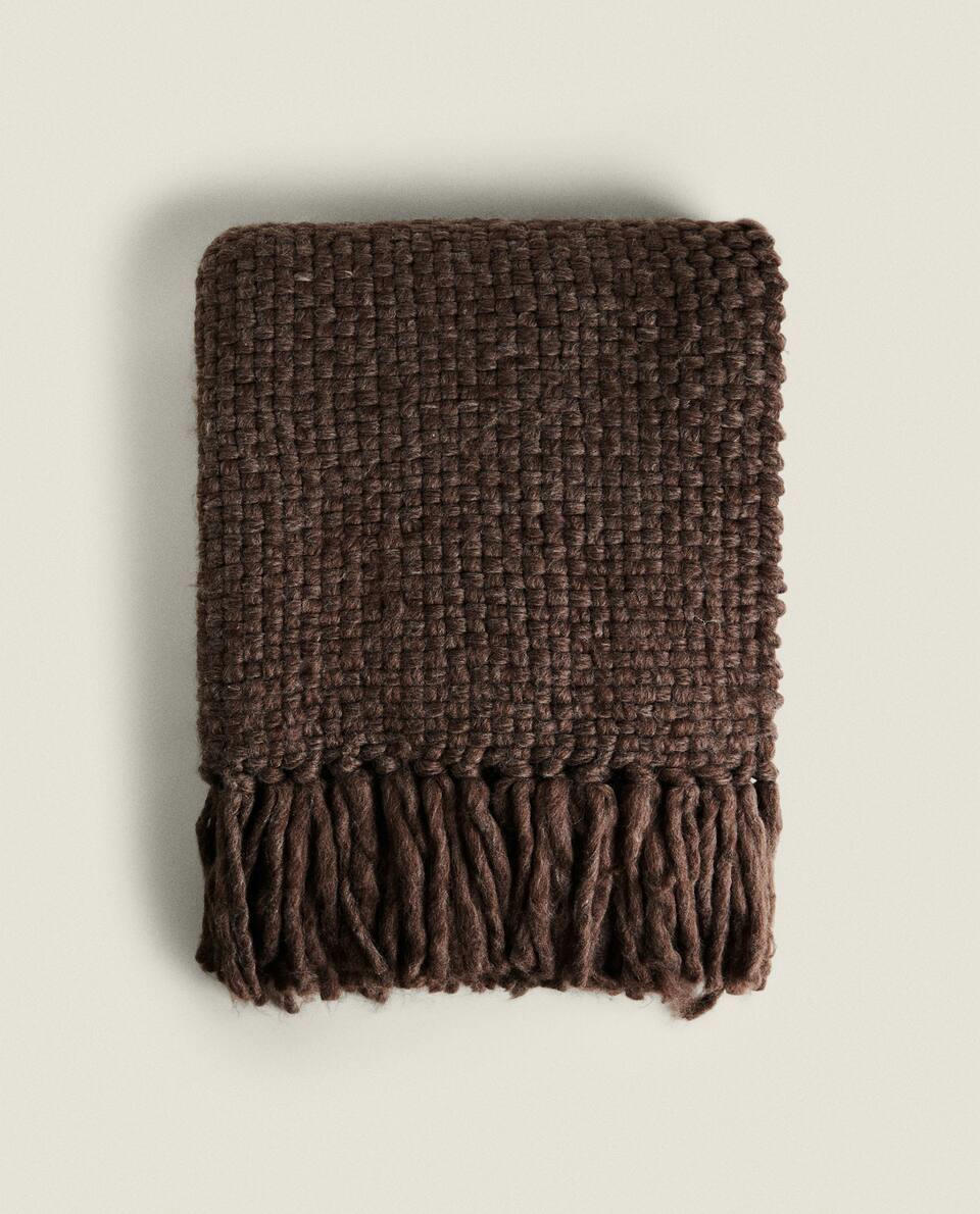 FRINGED KNIT BLANKET