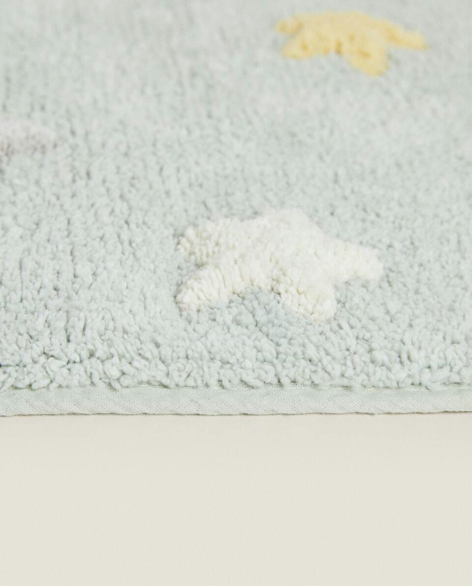 CHILDREN'S BATH MAT WITH POM-POM STARS