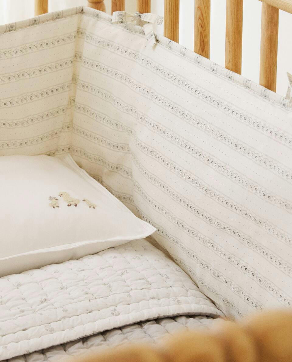 FLORAL BORDER COT BUMPER
