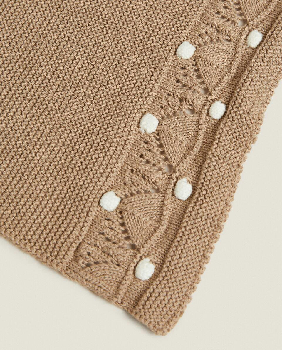 KNIT BLANKET WITH BORDER