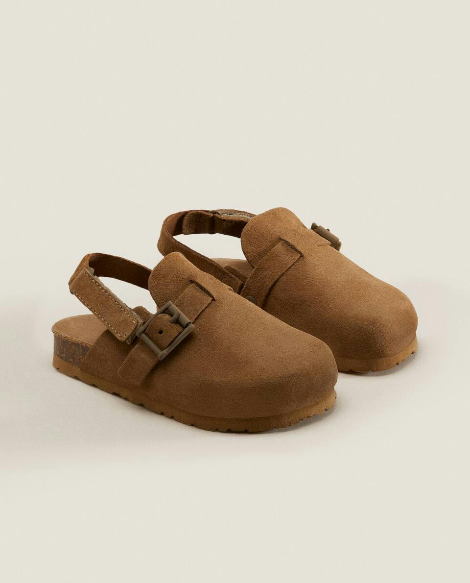 BUCKLED LEATHER CLOGS