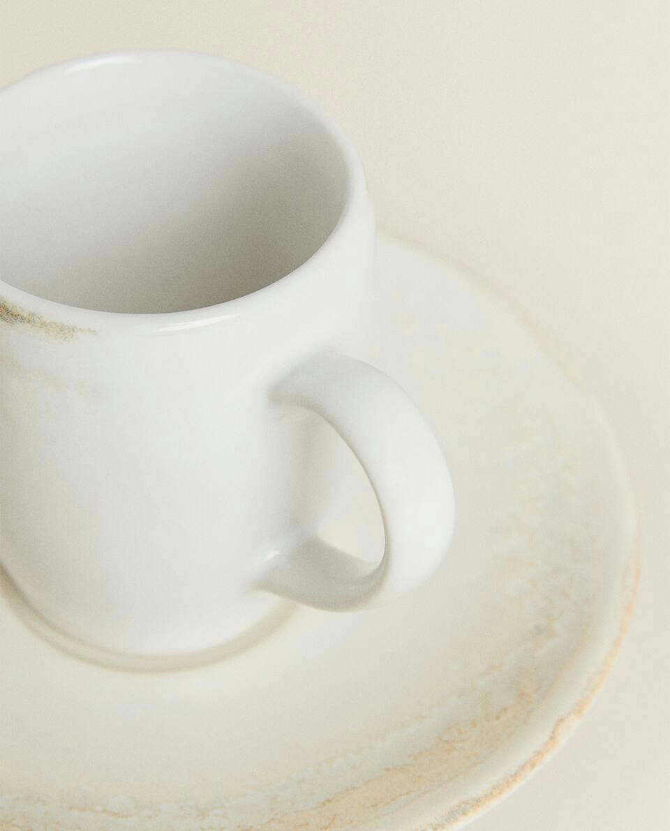 STONEWARE COFFEE CUP AND SAUCER