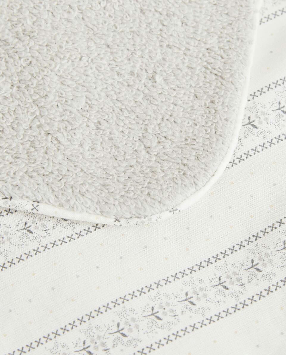 BIB WITH FLORAL BORDER