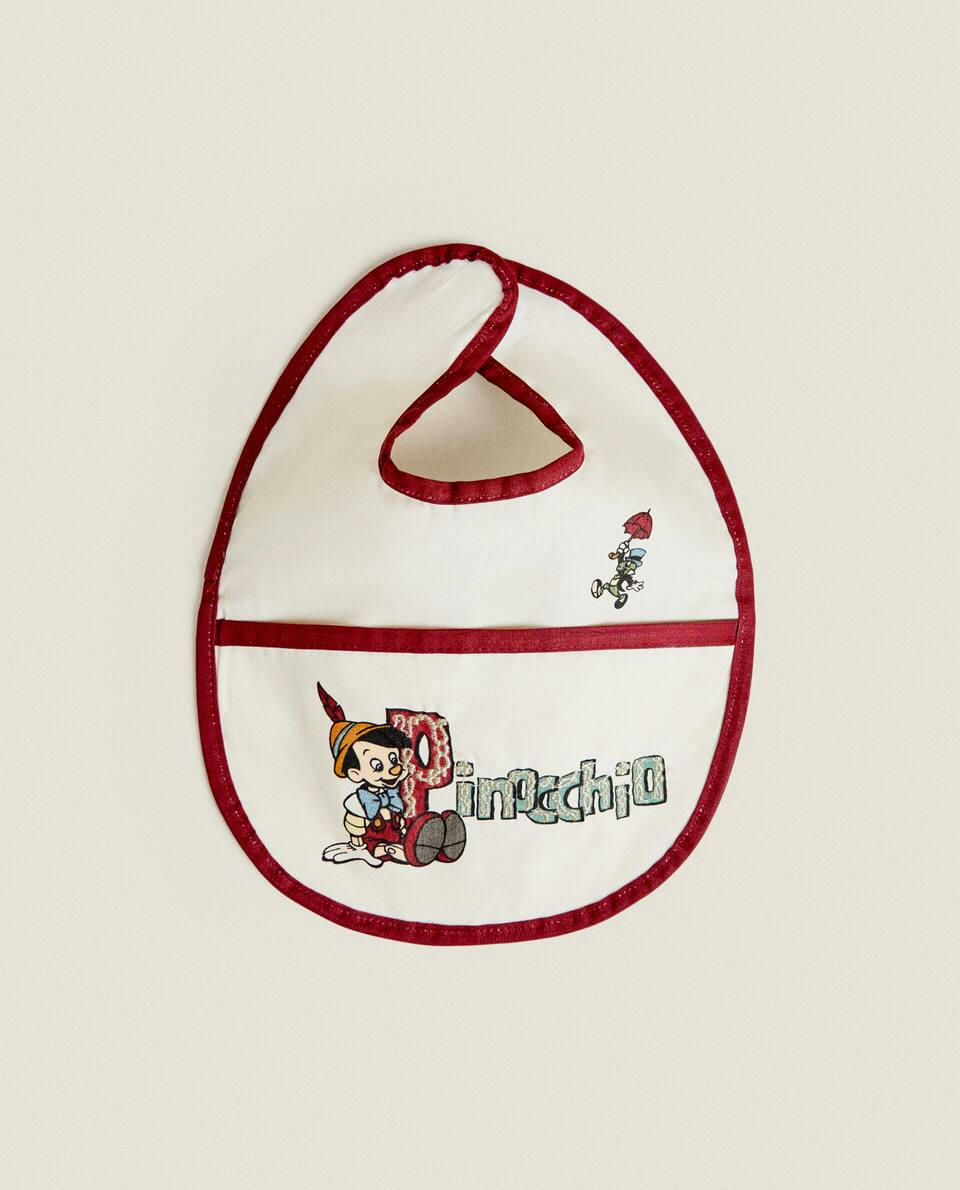 CHILDREN’S PINOCCHIO ? DISNEY RESIN-COATED CHRISTMAS BIB