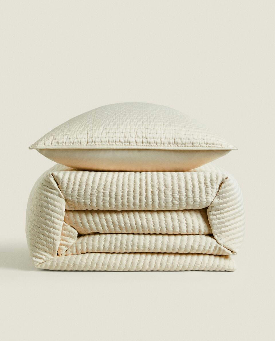 QUILT WITH TOPSTITCHING