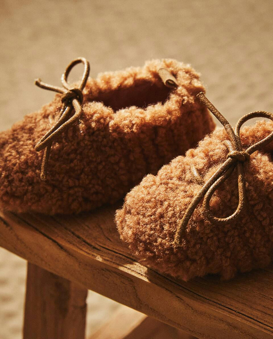 FAUX SHEARLING BOOTIES WITH BOW