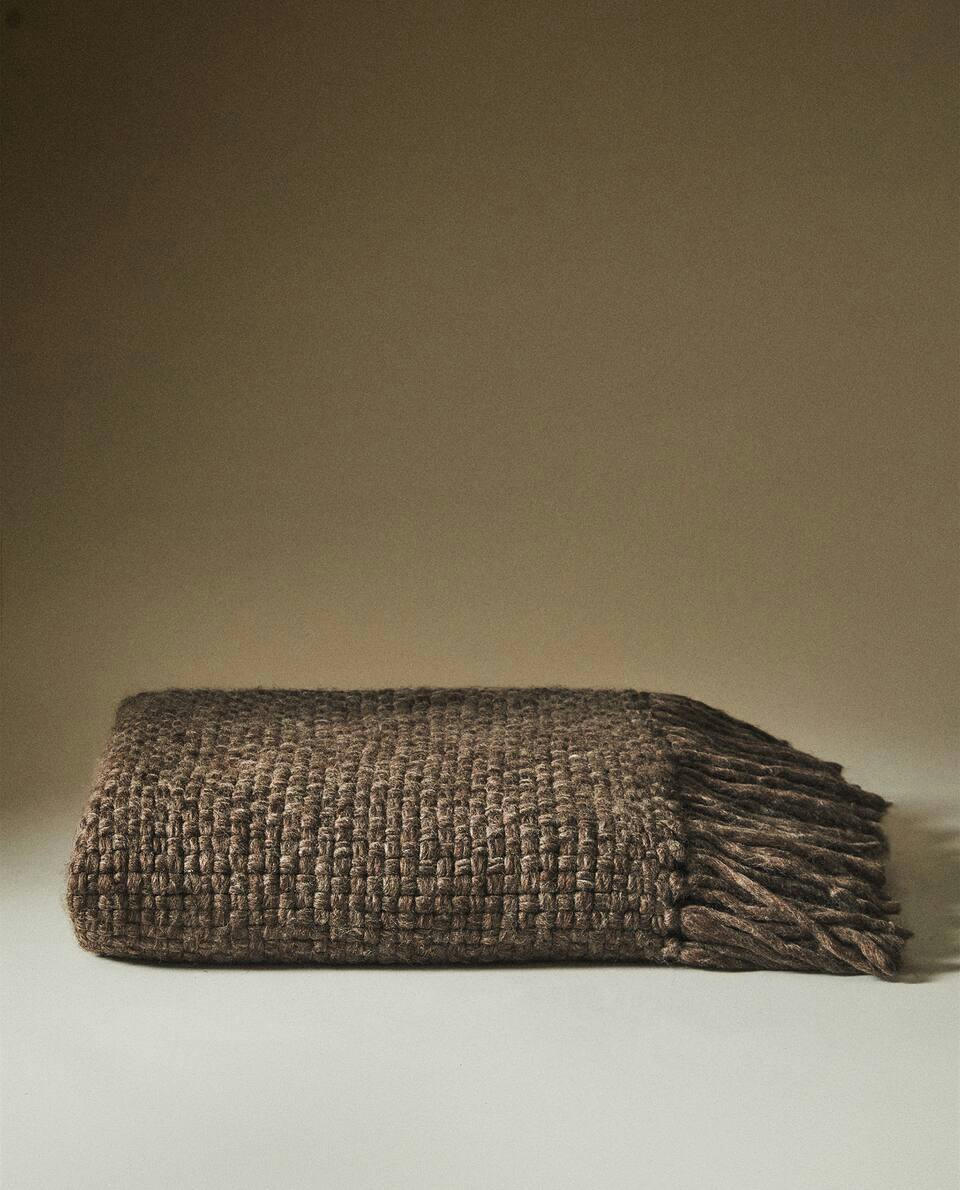 FRINGED KNIT BLANKET