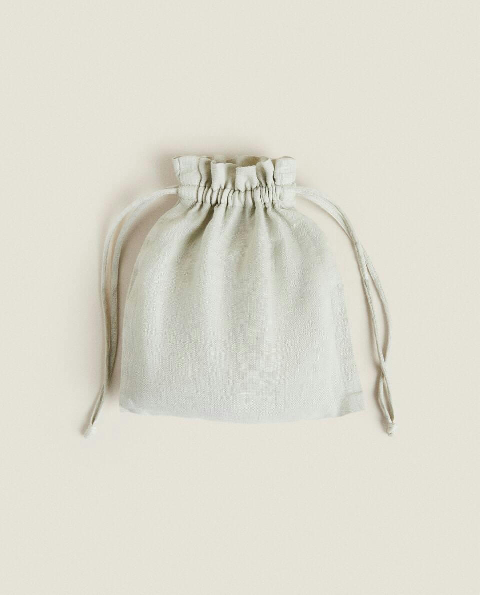 QUILTED LINEN SLIPPERS