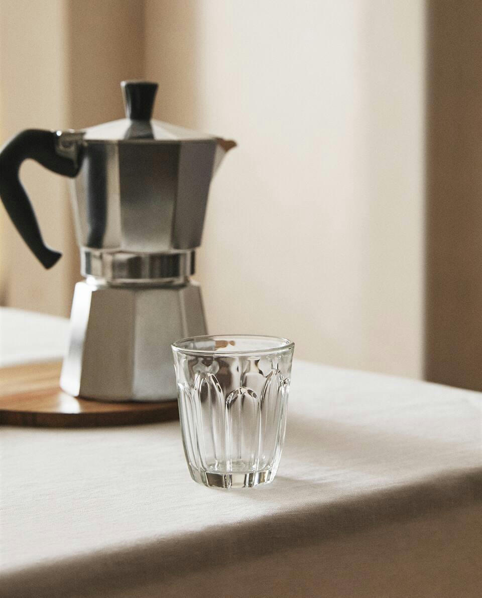 COFFEE TUMBLER WITH RAISED DESIGN