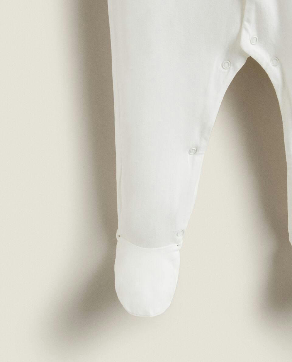 ROMPER WITH CONTRAST PIPING