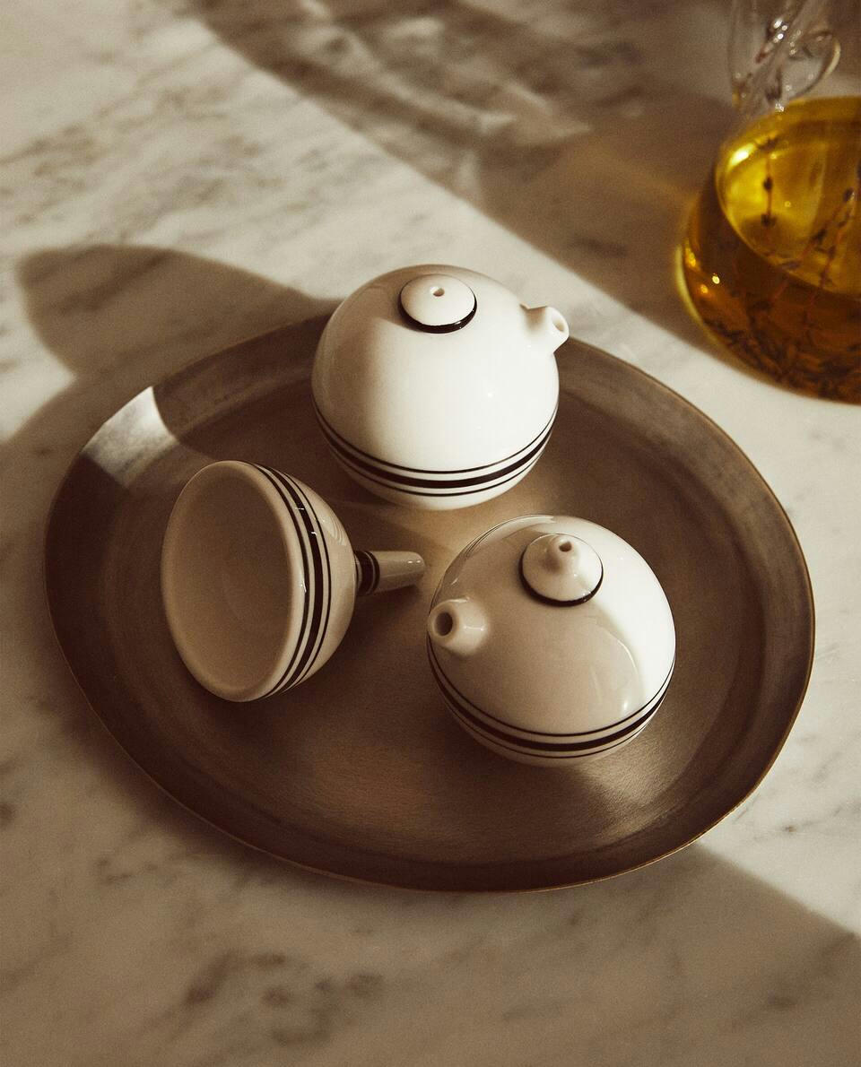 STONEWARE OIL AND VINEGAR CRUET SET WITH LINES