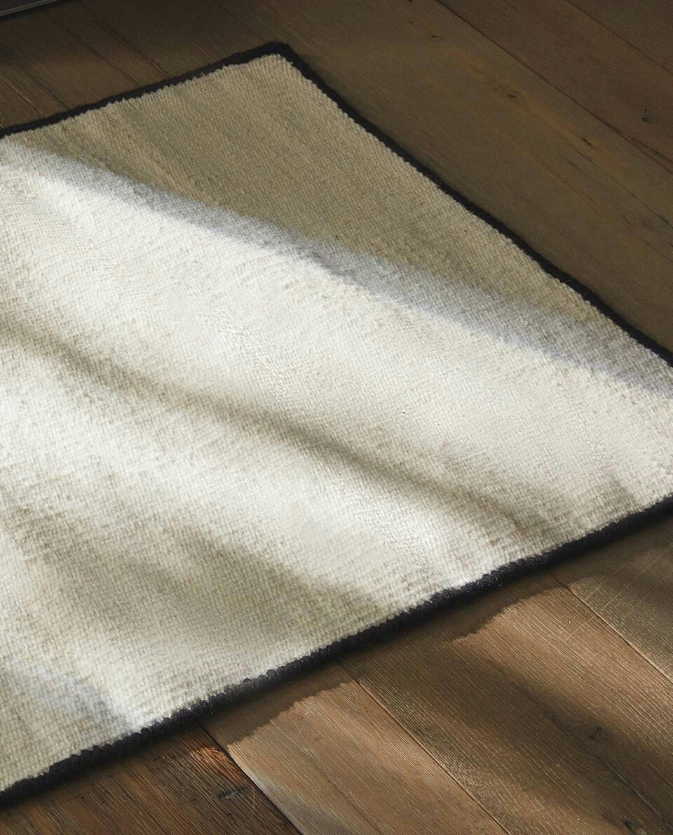 WOOL OVERLOCK RUG
