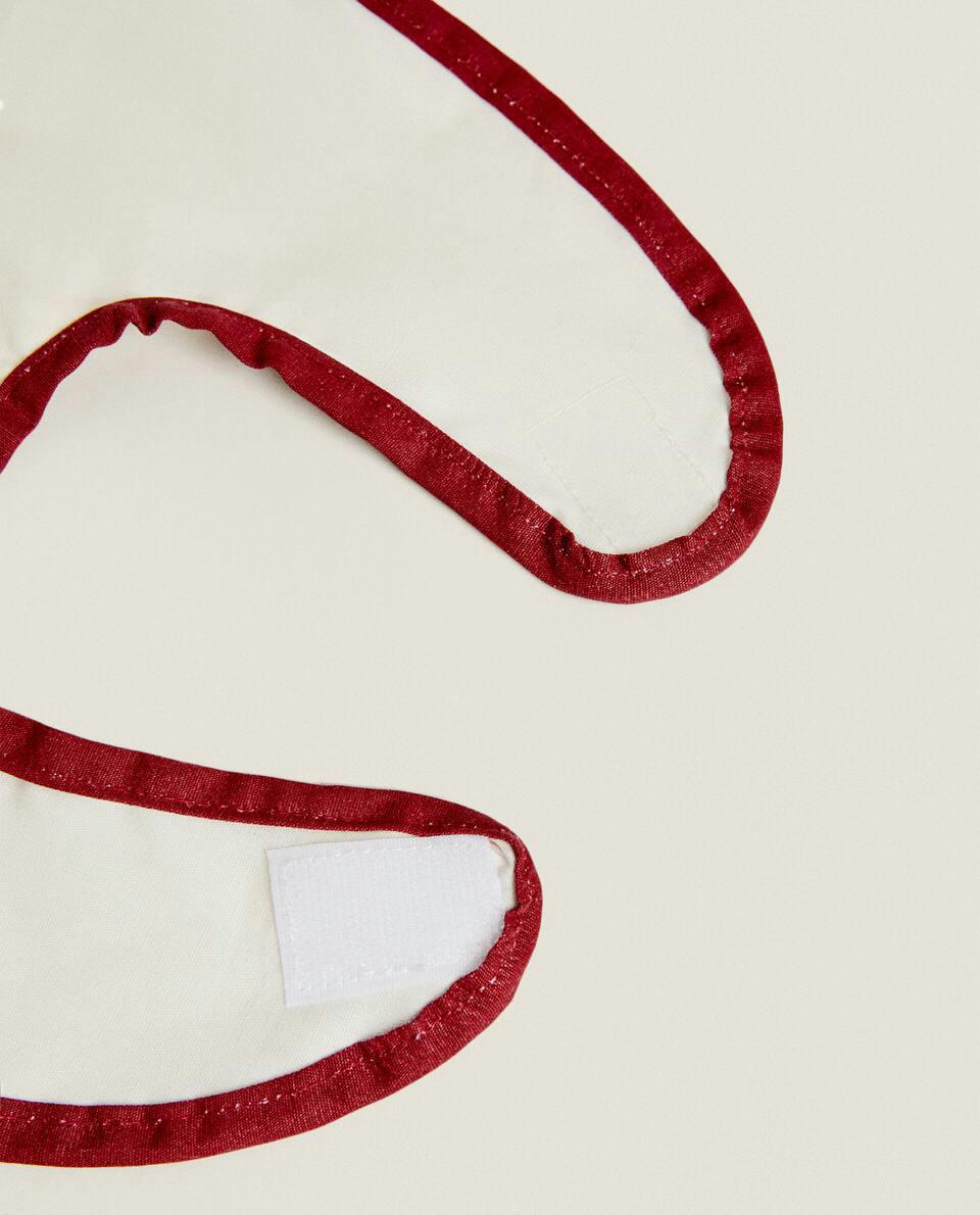 CHILDREN’S PINOCCHIO ? DISNEY RESIN-COATED CHRISTMAS BIB