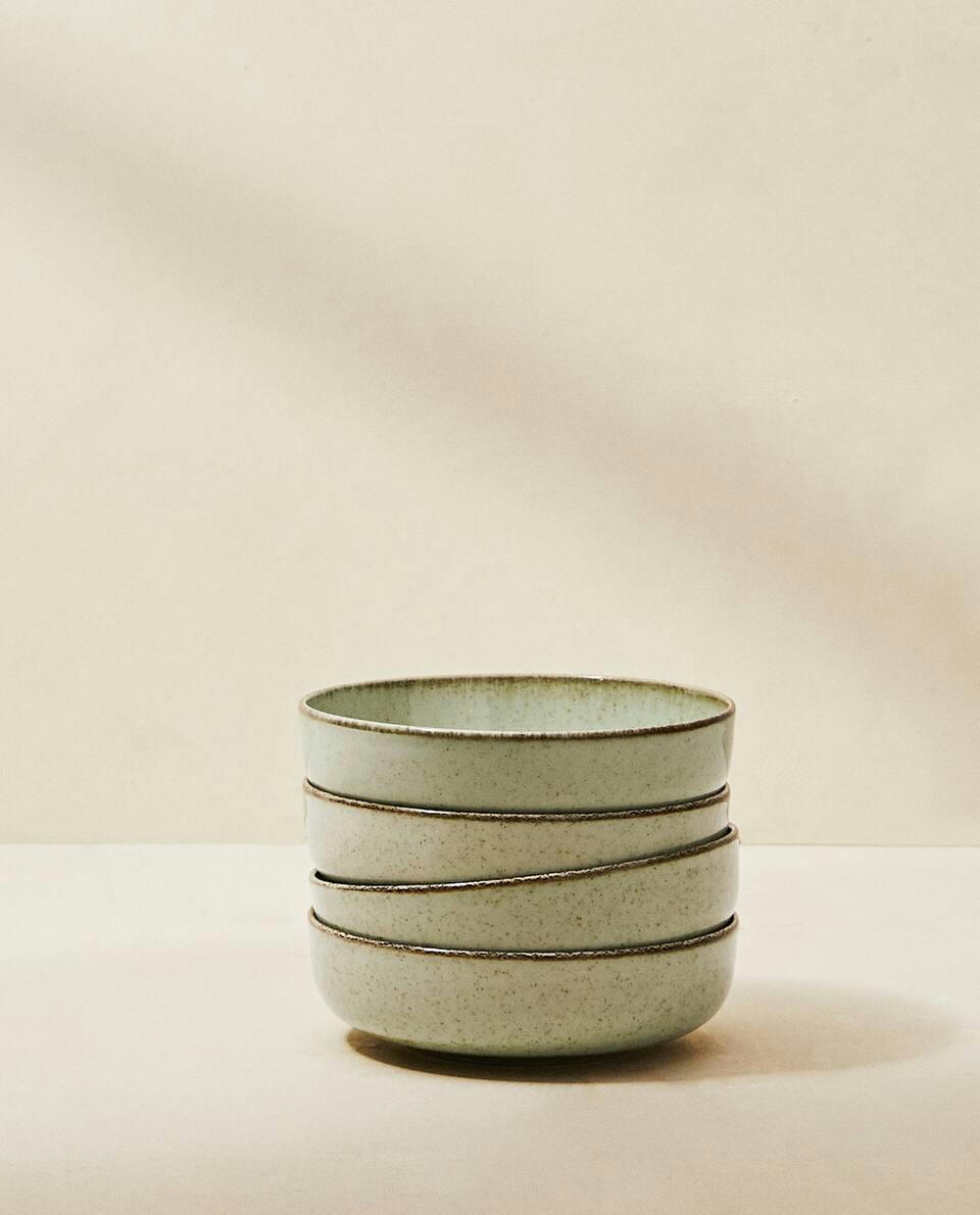 PORCELAIN BOWL WITH ANTIQUE FINISH RIM