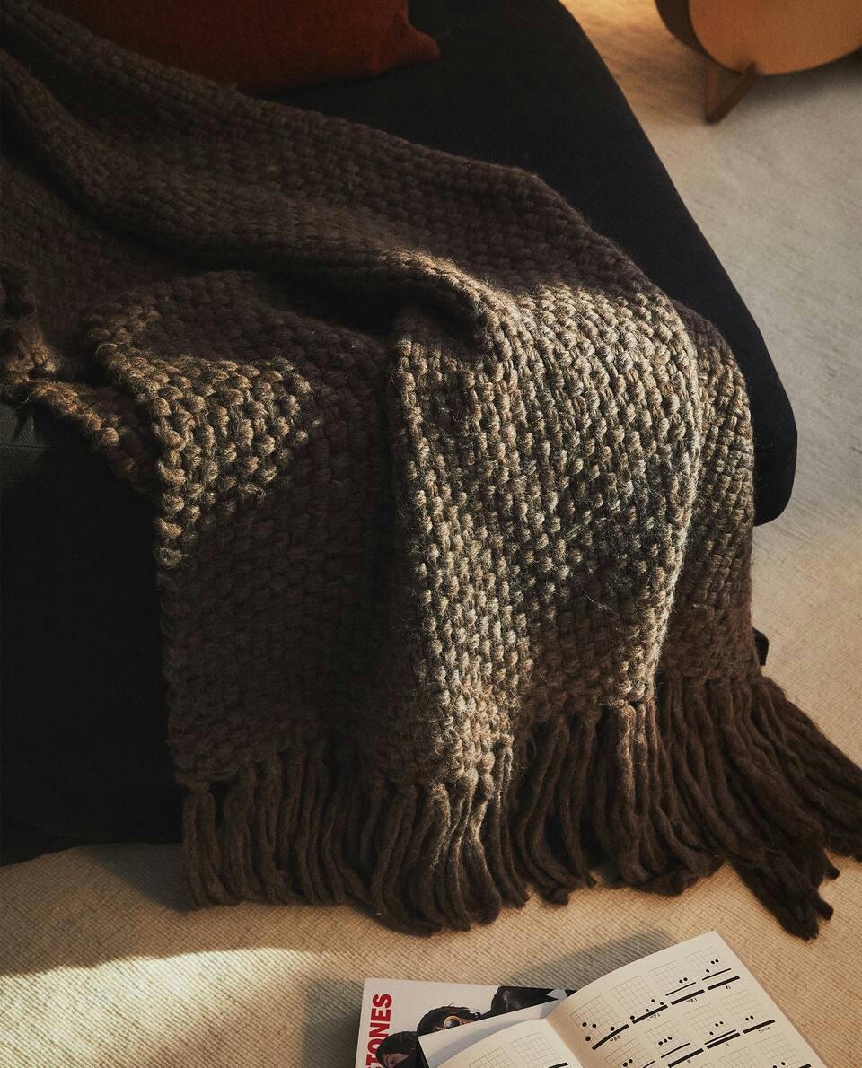 FRINGED KNIT BLANKET